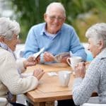 senior residents playing a card game